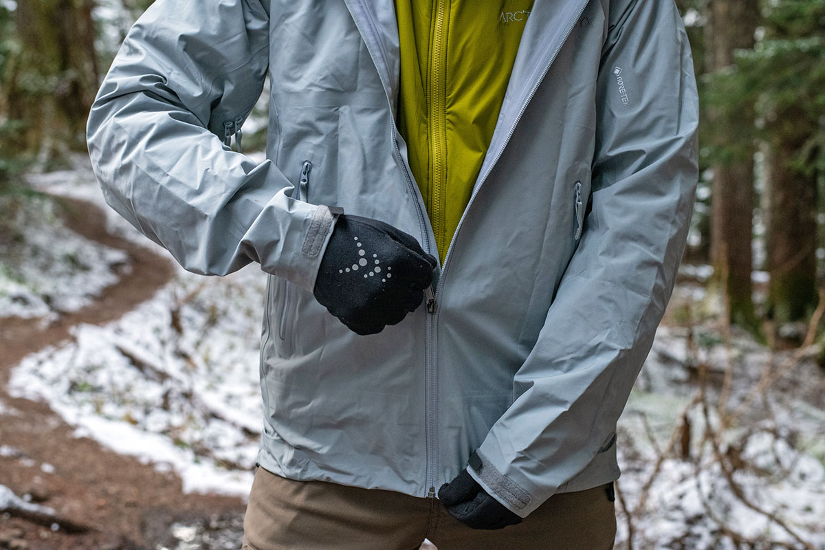 Arc'teryx Beta LT hardshell jacket (zipping up)