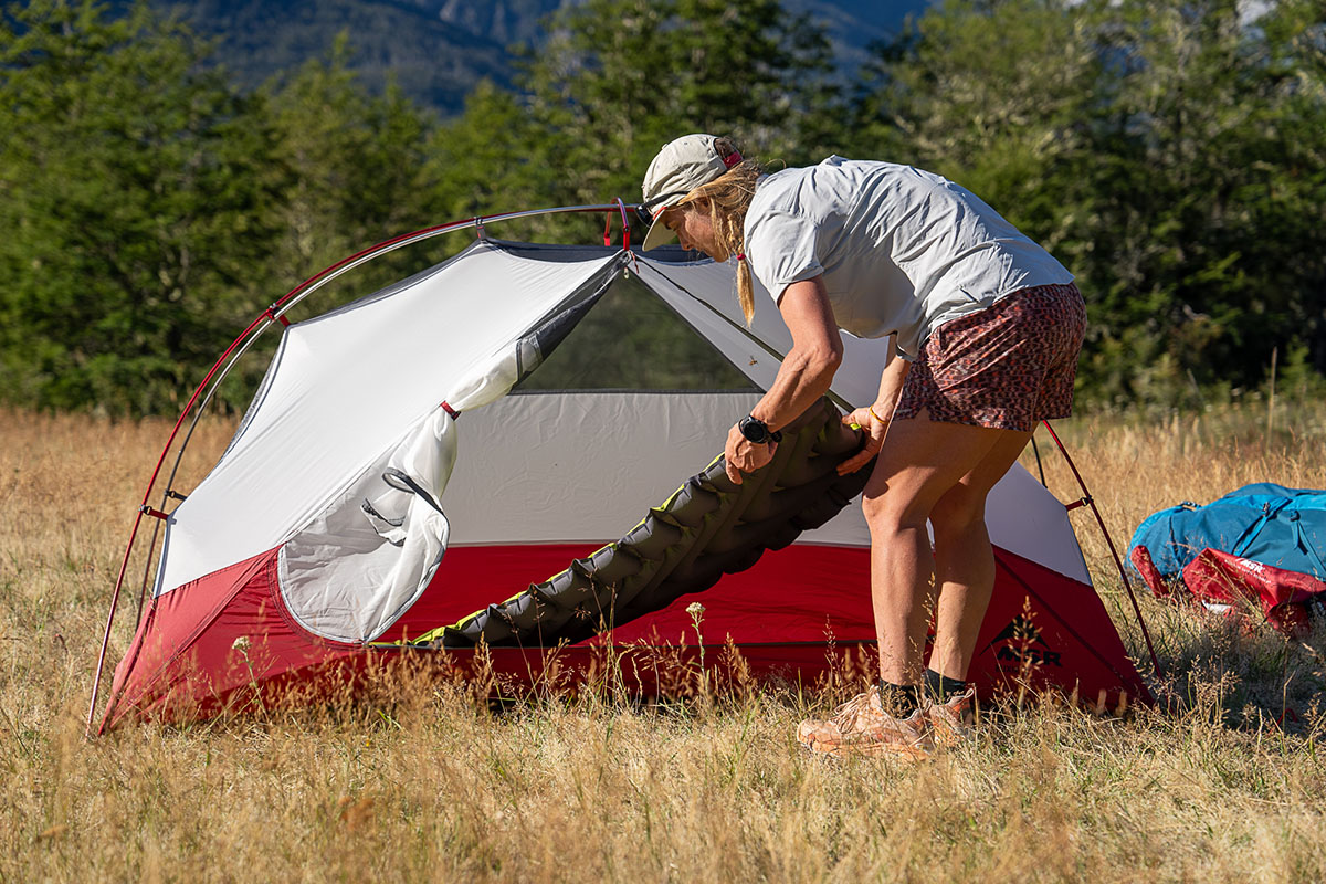 Backpacking sleeping pad (sliding pad into tent)