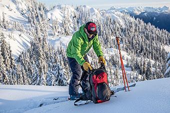 Black Diamond JetForce Pro 25 (putting on pack in the backcountry)