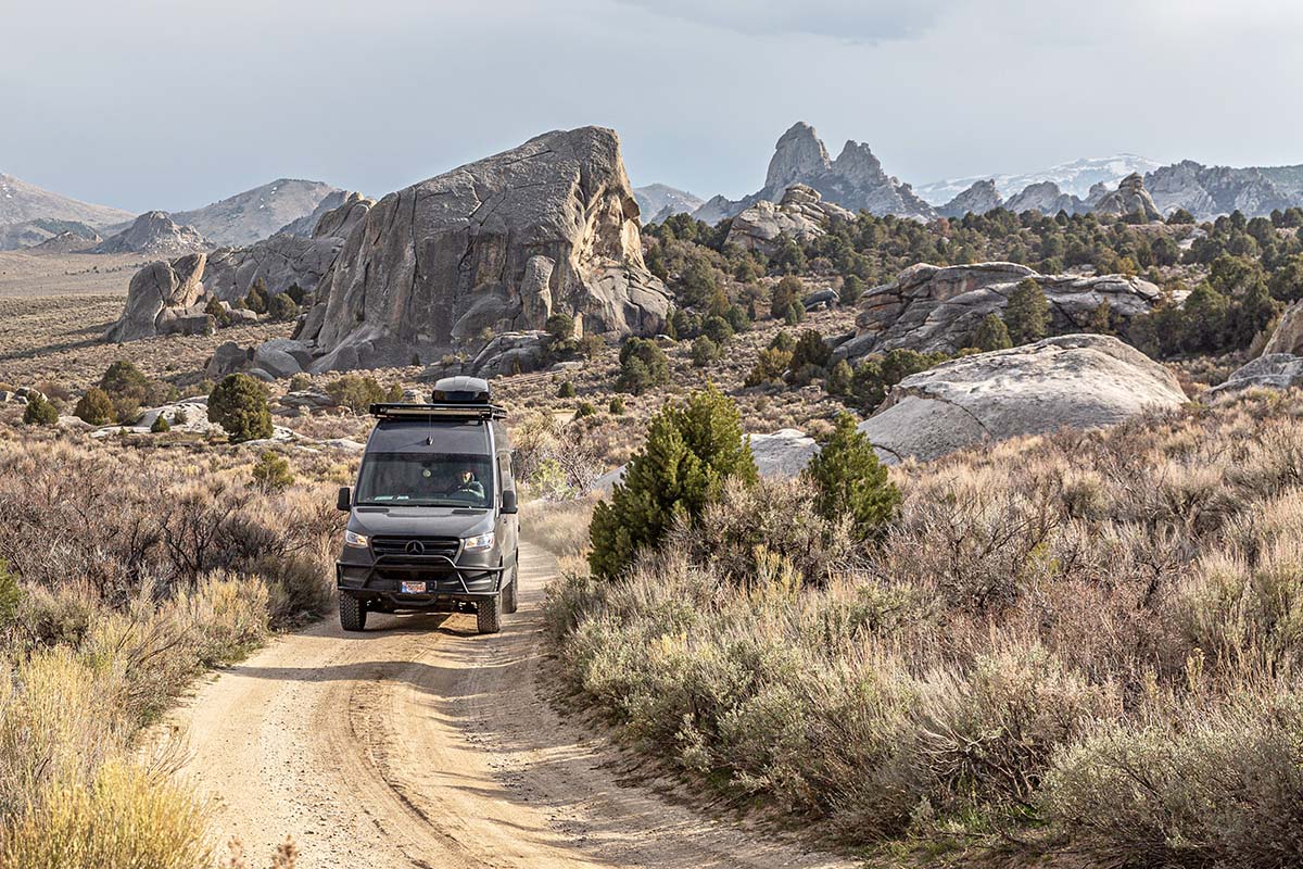 Driving Sprinter van with Thule Motion XT rooftop cargo box