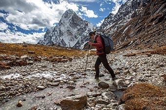 Hiking footwear (crossing creek in Salomon Quest 4)