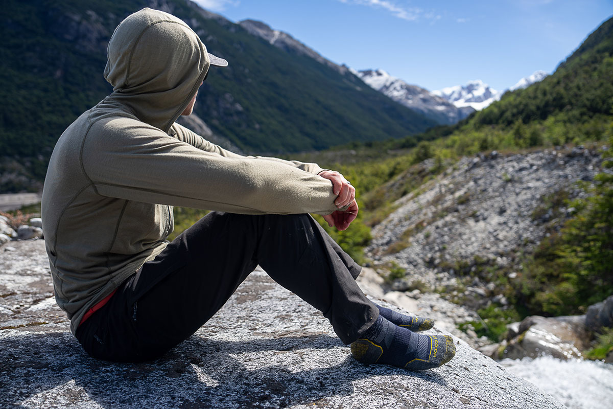 Hiking socks (sitting on rock wearing REI Flash socks)