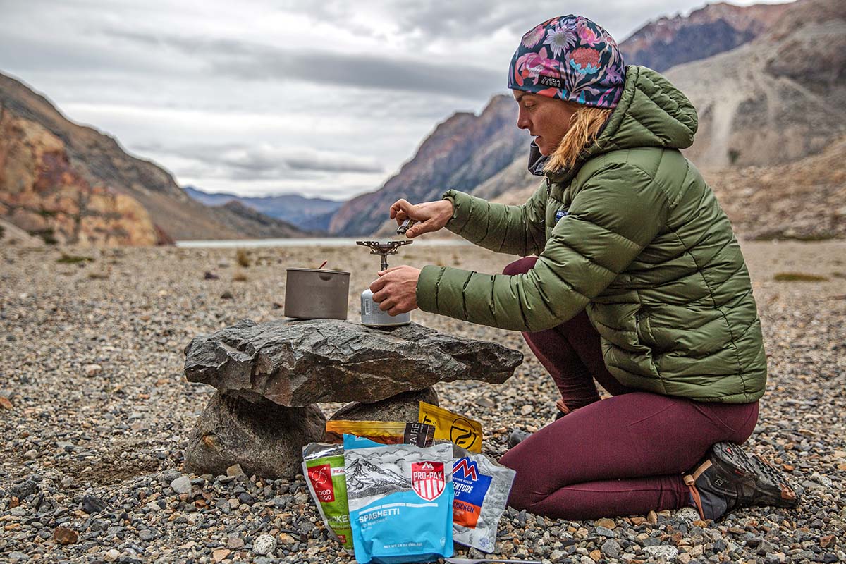 Lighting backpacking stove at La Playita (Patagonia)