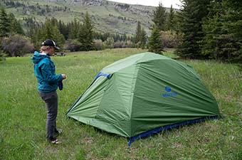 Marmot Tungsten 4P camping tent (standing next to tent)