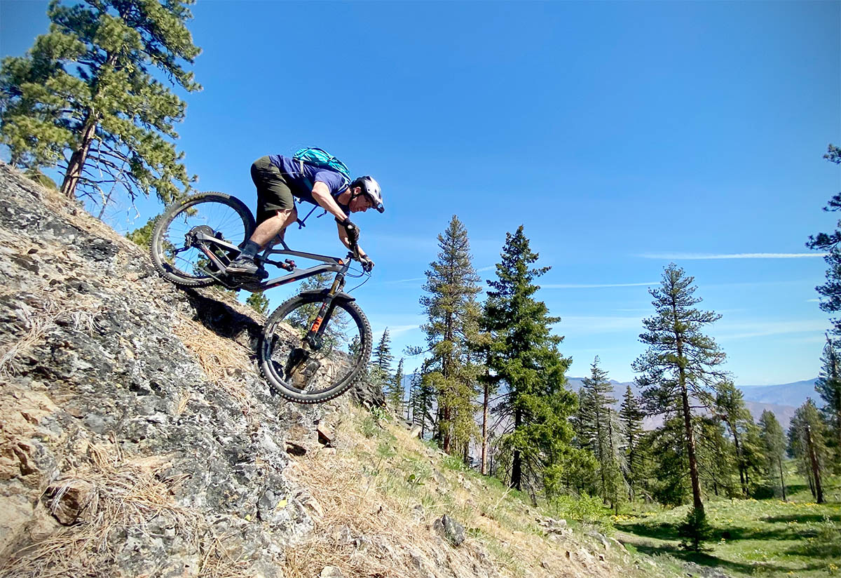 Mountain bike helmet (Troy Lee Designs A3 MIPS on rocky descent)