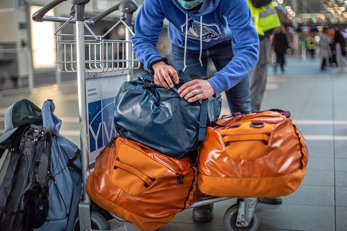 Packing duffel bags at the airport