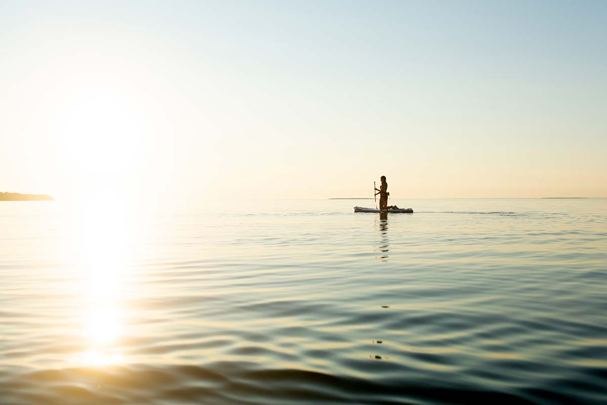 Paddle boarding (SUPping) on glassy water