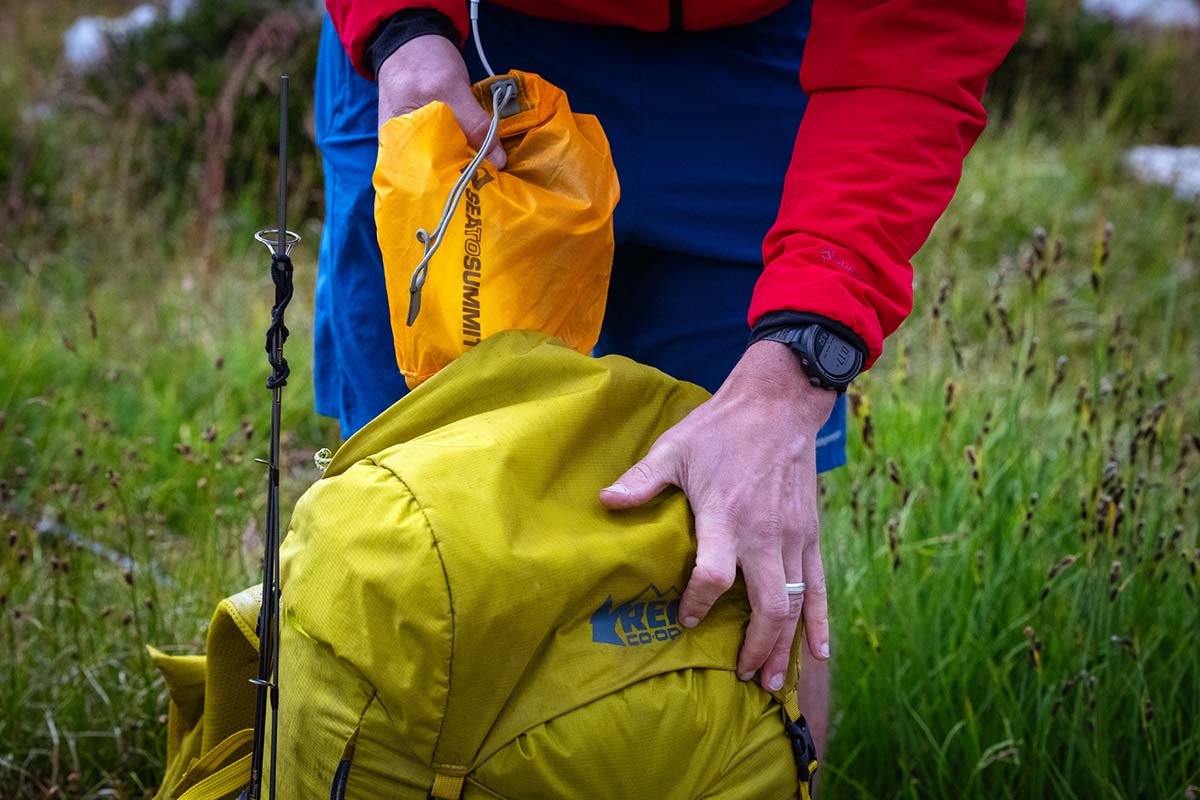 Pulling Sea to Summit stuff sack from backpacking pack