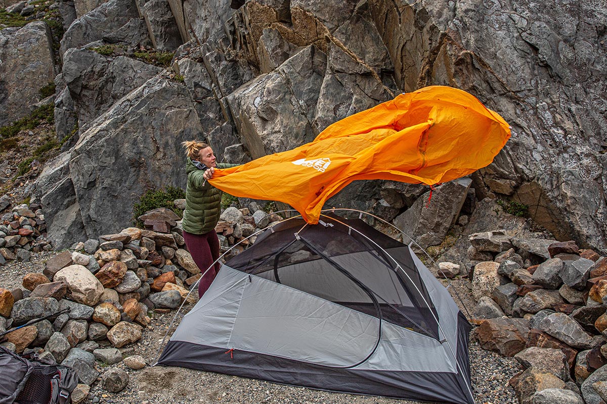 REI Co-op Trail Hut 2 Backpacking Tent (putting on the rain fly)_0