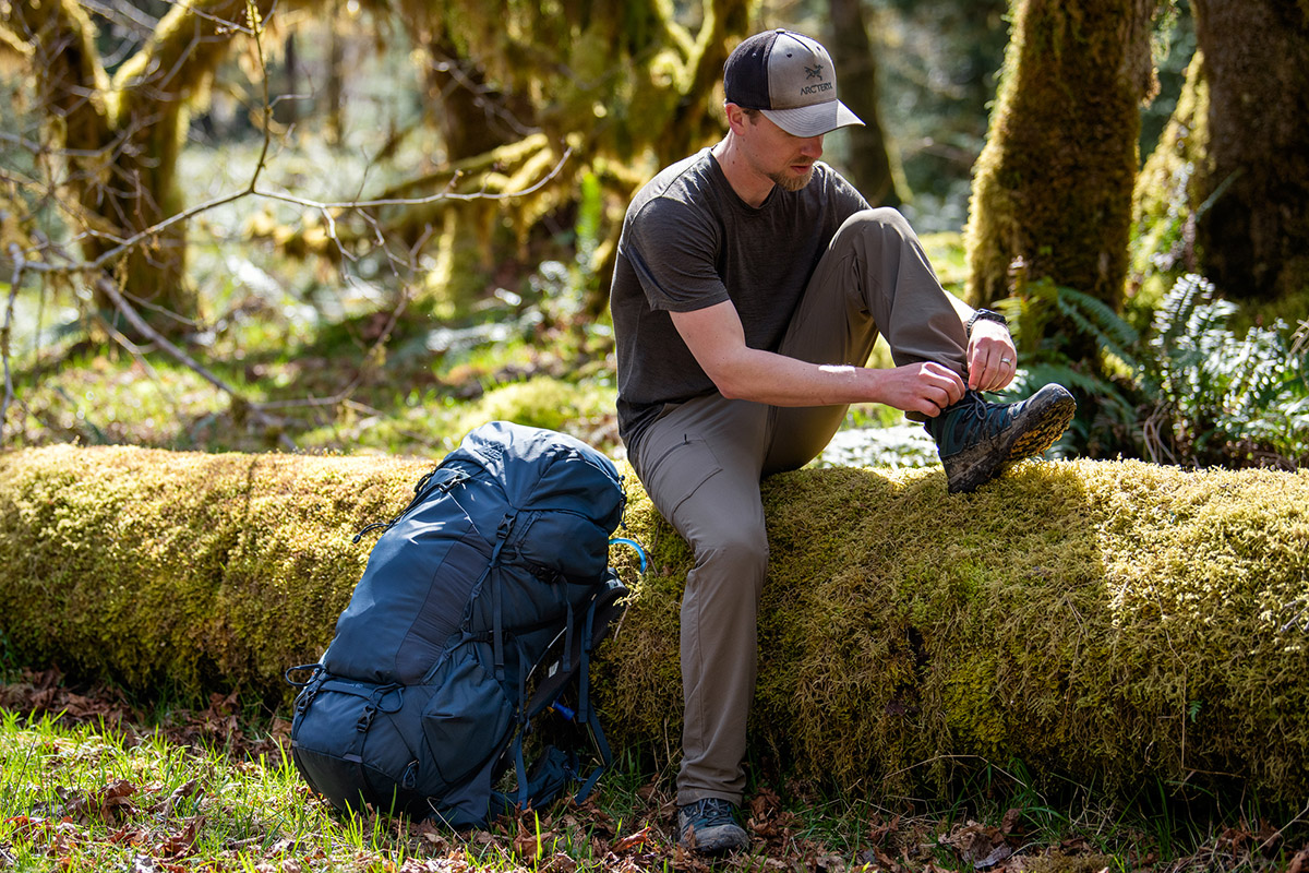 Salomon X Ultra 4 Mid hiking boot (lacing up on log)