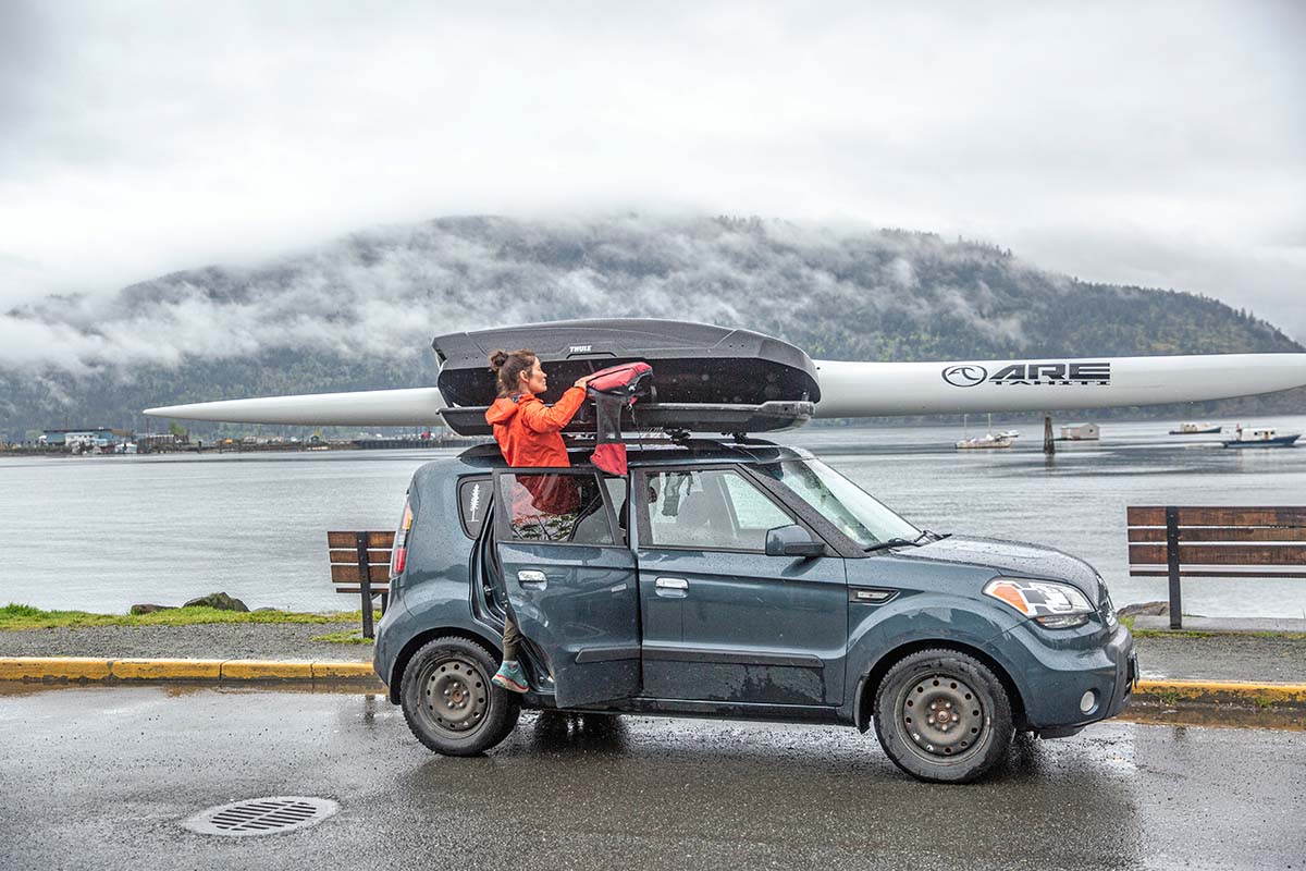 Thule Motion XT XL rooftop cargo box (with boat on roof)