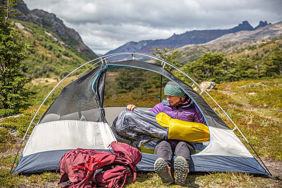 Unpacking sleeping bag in tent